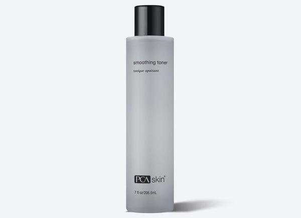 A bottle of PCA SKIN Smoothing Toner, which is an alcohol-free toner formulated with lactic and citric acids, and aloe.